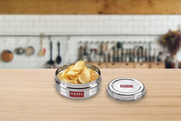A can of chips on a table