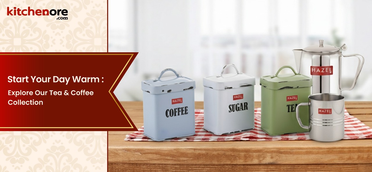 KitchenOre Hazel Tea and Coffee Collection featuring stylish stainless steel and pastel containers for coffee, sugar and tea, with kettle and mug on a wooden table promoting “Start Your Day Warm